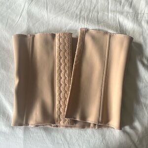 Small nude skims waist trainer with black carrier